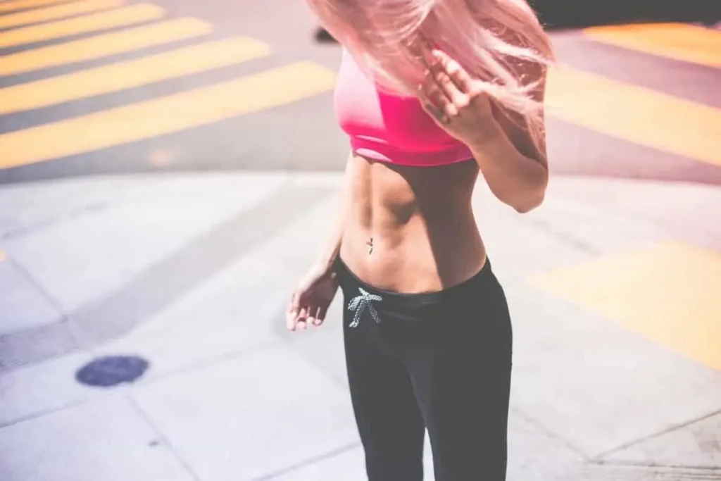 Woman with toned stomach after LA-EMS Body Sculpting Treatment Witney 